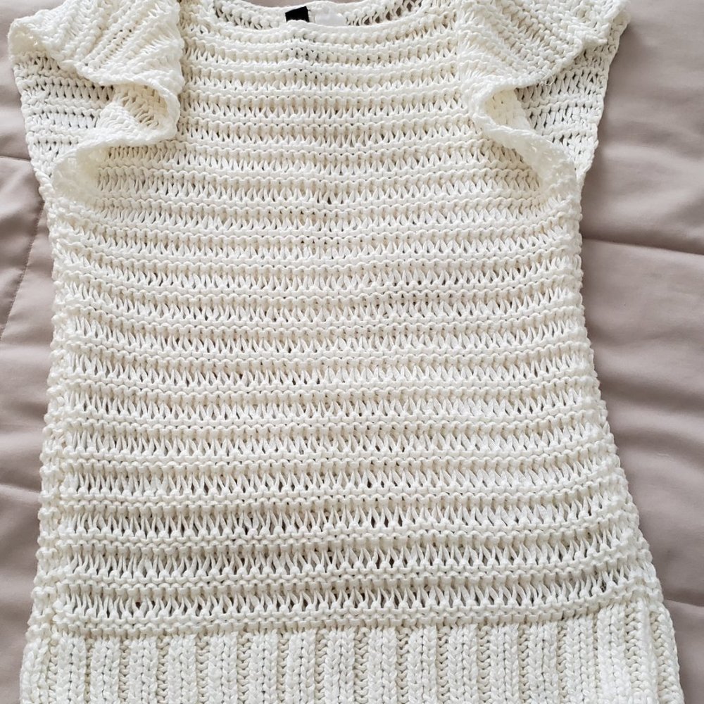 Cream silky cotton Sleeveless top. NWOT. XS size. Excellent condition!